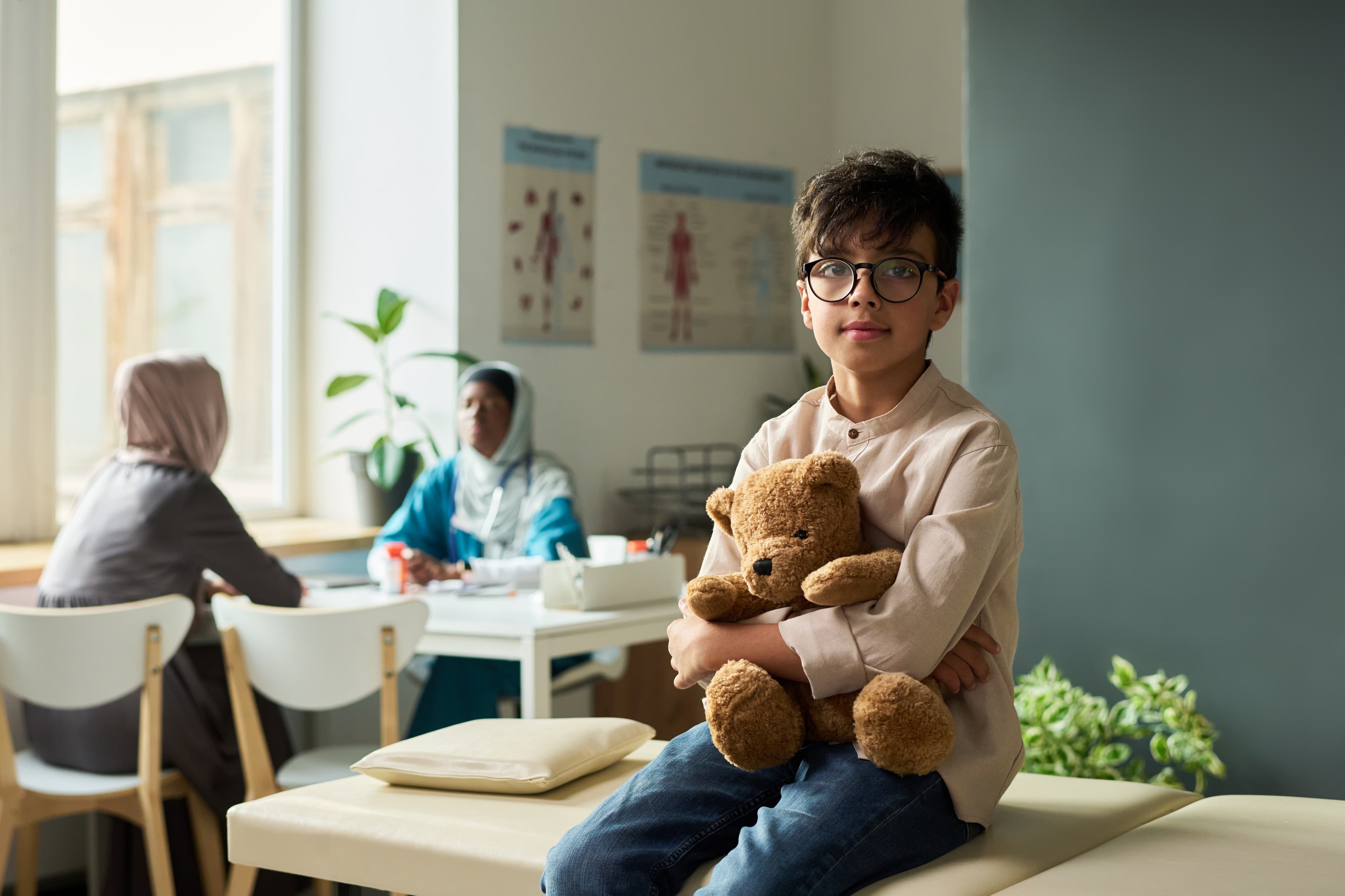 Young boy with teddy bear